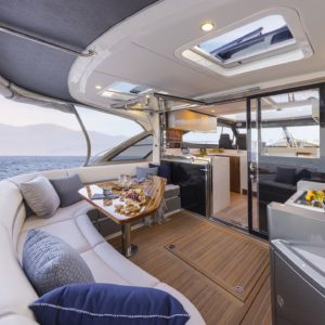 Riviera-4600-Sport-Yacht-Platinum-Edition-Cockpit-01-Gloss-Walnut-Timber-Finish