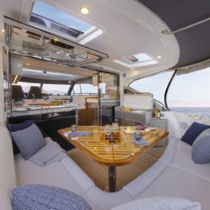 Riviera-4600-Sport-Yacht-Platinum-Edition-Cockpit-02-Gloss-Walnut-Timber-Finish